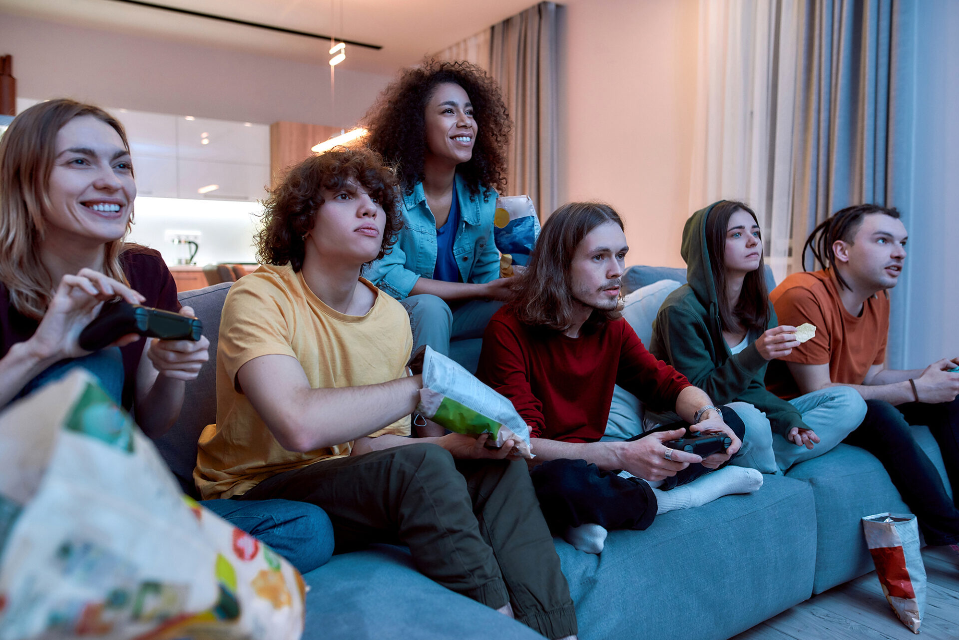 A group of friends playing video games.