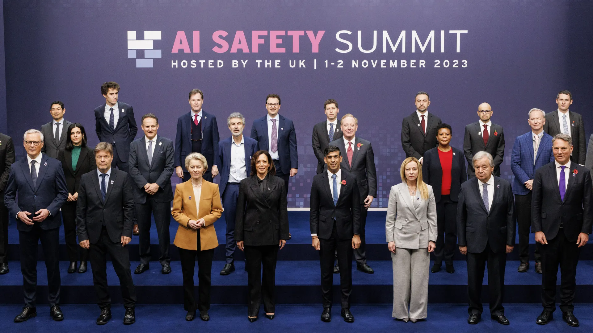 Leaders and speakers from the AI Safety Summit standing in a row.